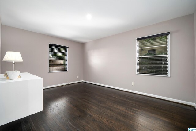 interior space with dark hardwood / wood-style floors