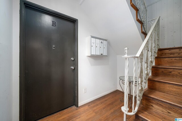 entryway with wood-type flooring