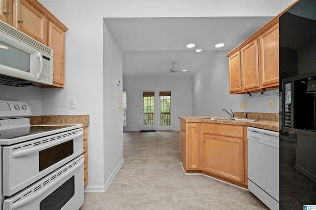 kitchen featuring light brown cabinetry, white appliances, sink, kitchen peninsula, and ceiling fan