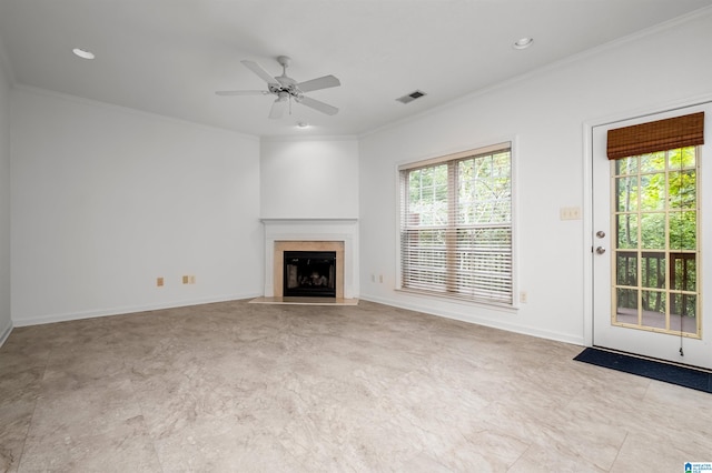 unfurnished living room featuring crown molding and ceiling fan