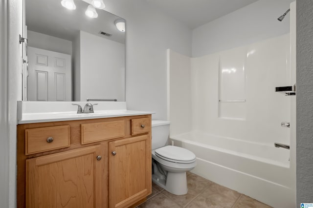 full bathroom featuring tile patterned flooring, toilet, shower / washtub combination, and vanity