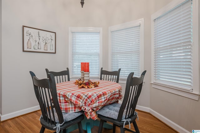 dining area with a healthy amount of sunlight and light wood-type flooring