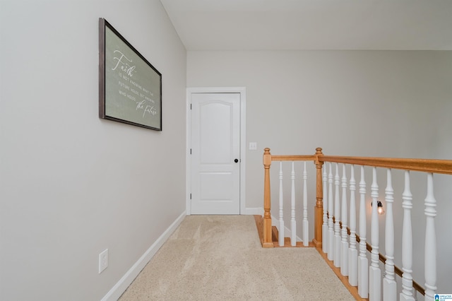 hall featuring carpet floors