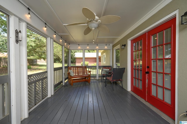 deck featuring ceiling fan and french doors