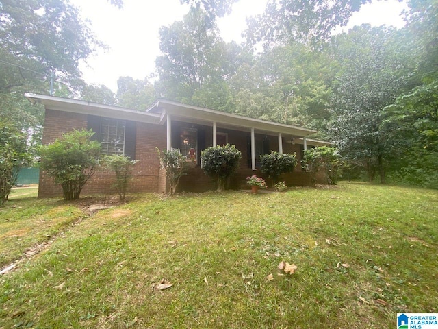 exterior space with a yard