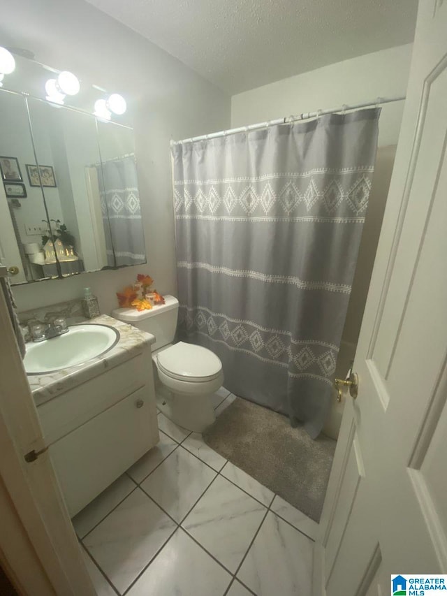 full bath featuring toilet, a textured ceiling, curtained shower, and vanity
