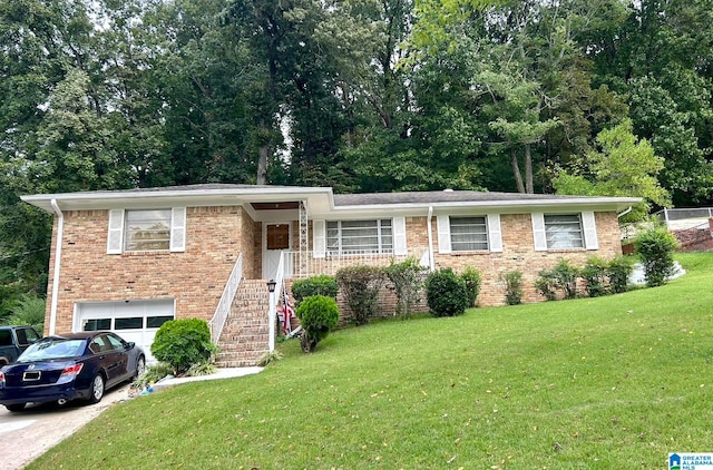 view of front of property featuring a garage and a front yard