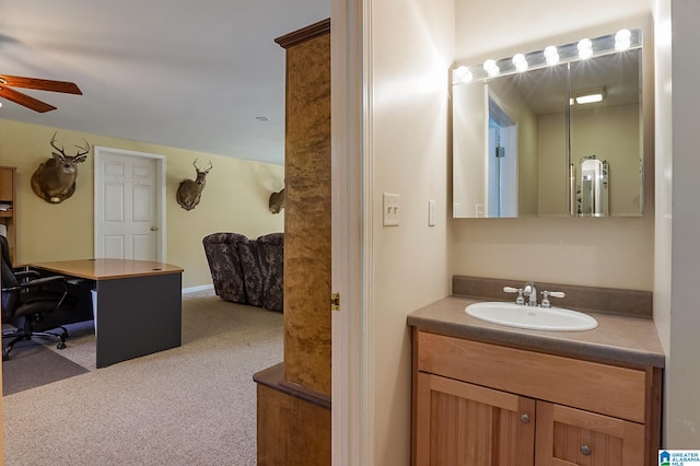 bathroom featuring vanity and ceiling fan