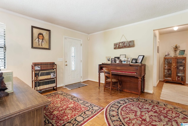 entryway with light parquet floors, crown molding, and a textured ceiling