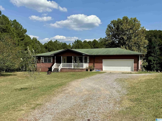 view of front of house with driveway, crawl space, an attached garage, a front lawn, and a porch