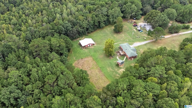 drone / aerial view with a view of trees