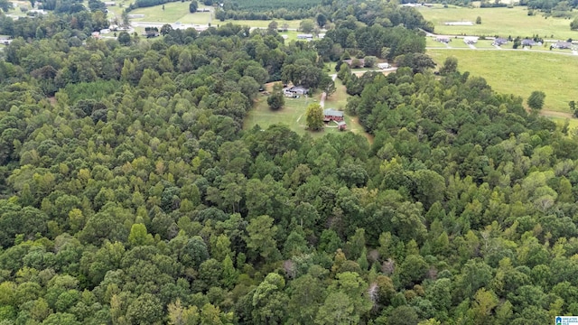 bird's eye view featuring a rural view and a view of trees