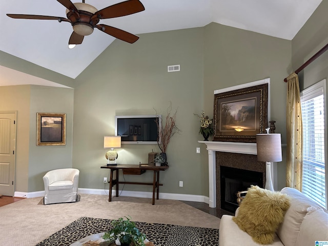 living room featuring carpet floors, high vaulted ceiling, and ceiling fan