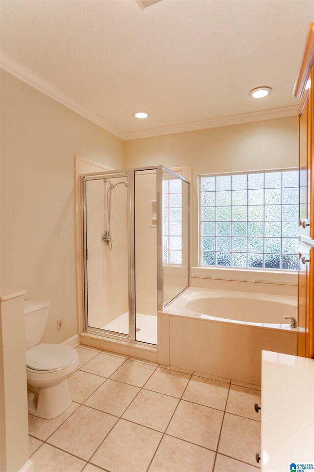 bathroom with independent shower and bath, toilet, and crown molding