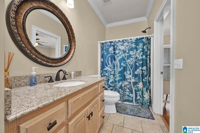 bathroom featuring vanity, toilet, ornamental molding, a shower with curtain, and tile patterned floors