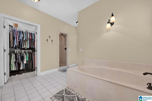 bathroom featuring separate shower and tub and tile patterned flooring