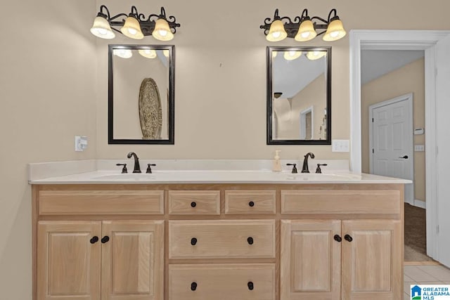 bathroom featuring tile patterned floors and vanity