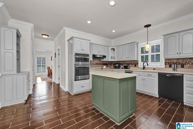 kitchen with pendant lighting, dishwasher, dark hardwood / wood-style flooring, a center island, and double oven