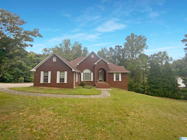 single story home featuring a front yard