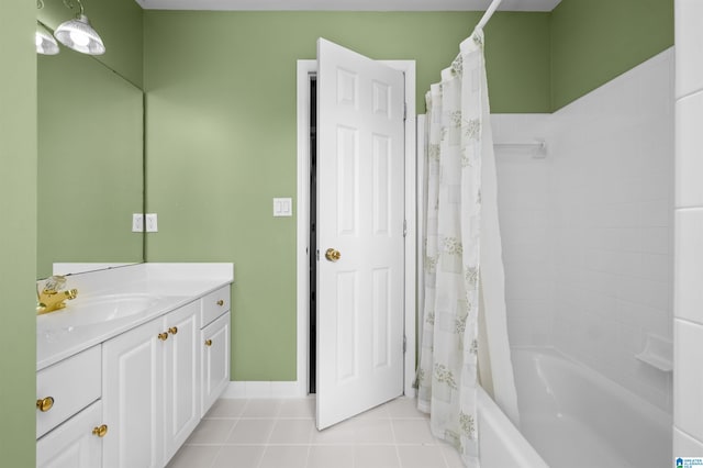 bathroom featuring shower / bath combo, tile patterned flooring, and vanity