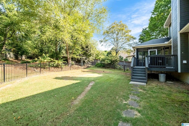 view of yard with a sunroom