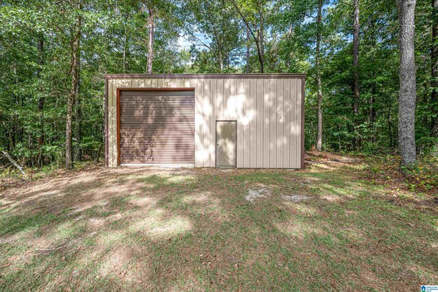 view of outbuilding featuring a garage