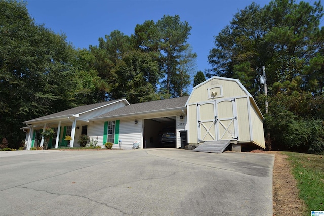 garage with covered porch