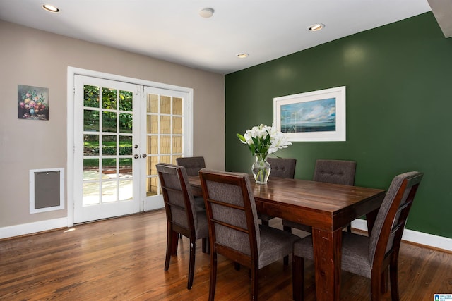 dining space featuring dark hardwood / wood-style floors and french doors