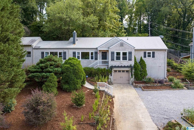 ranch-style house featuring a garage