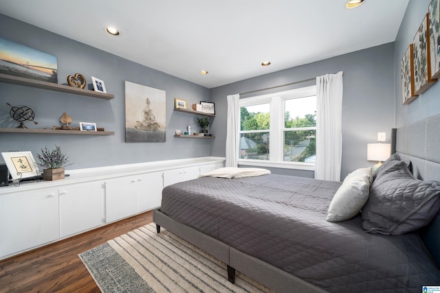 bedroom featuring dark wood-type flooring