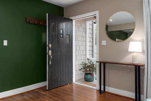 entrance foyer with dark hardwood / wood-style floors