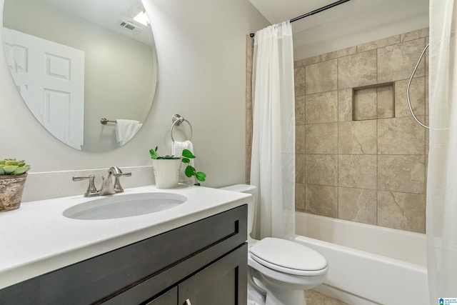 full bathroom featuring vanity, toilet, and shower / bath combo with shower curtain