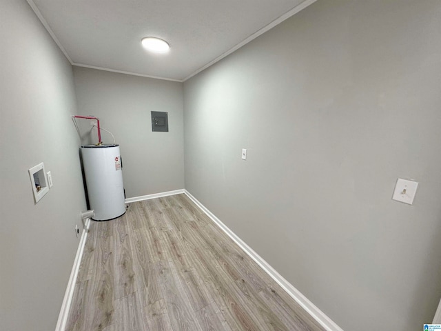 laundry area featuring hookup for a washing machine, light hardwood / wood-style flooring, water heater, ornamental molding, and electric panel