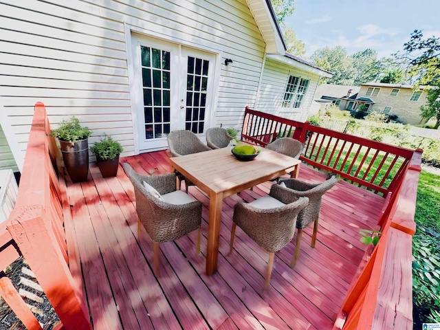 wooden deck featuring french doors