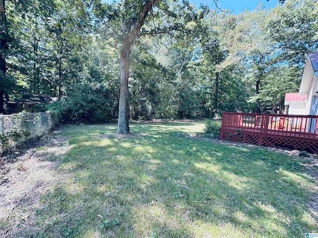 view of yard featuring a deck