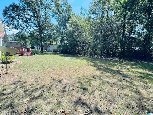 view of yard featuring a deck