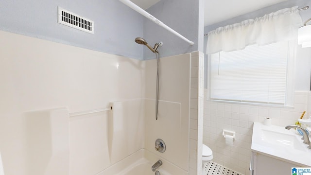 full bathroom with vanity, toilet, and shower / bathtub combination