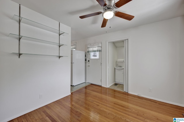 1717 Center Way S, Birmingham, AL 35205 - unfurnished room with wood finished floors, baseboards, and a ceiling fan