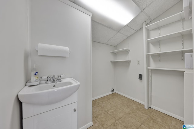 1717 Center Way S, Birmingham, AL 35205 - laundry room with a sink, baseboards, and light floors