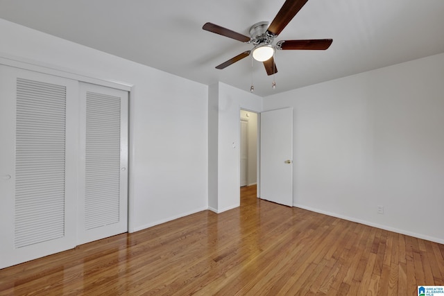 1717 Center Way S, Birmingham, AL 35205 - unfurnished bedroom with a closet, wood finished floors, baseboards, and a ceiling fan