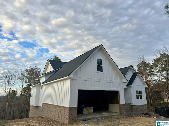 view of property exterior with a garage