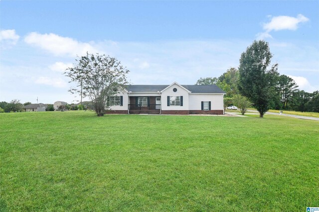 ranch-style house with a front yard