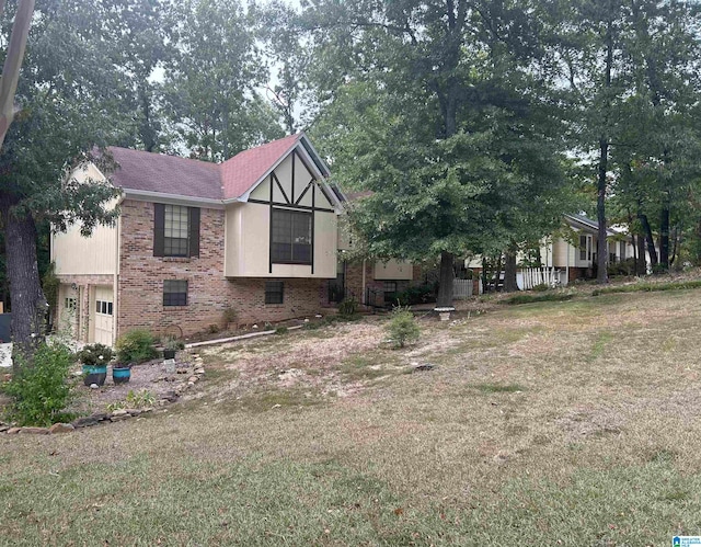 view of property exterior featuring a lawn