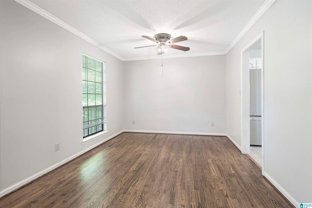 unfurnished room featuring dark wood-type flooring, crown molding, a textured ceiling, and ceiling fan