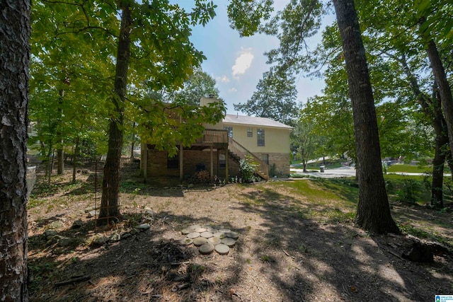 view of yard featuring a deck