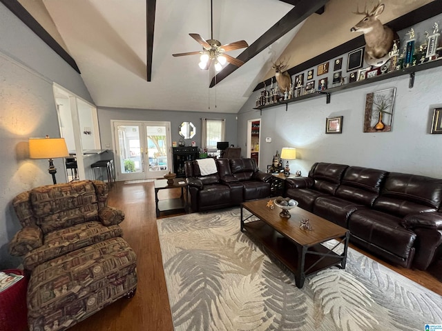 living room featuring ceiling fan, high vaulted ceiling, and light hardwood / wood-style floors