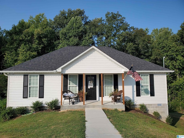 single story home featuring a front yard and a porch