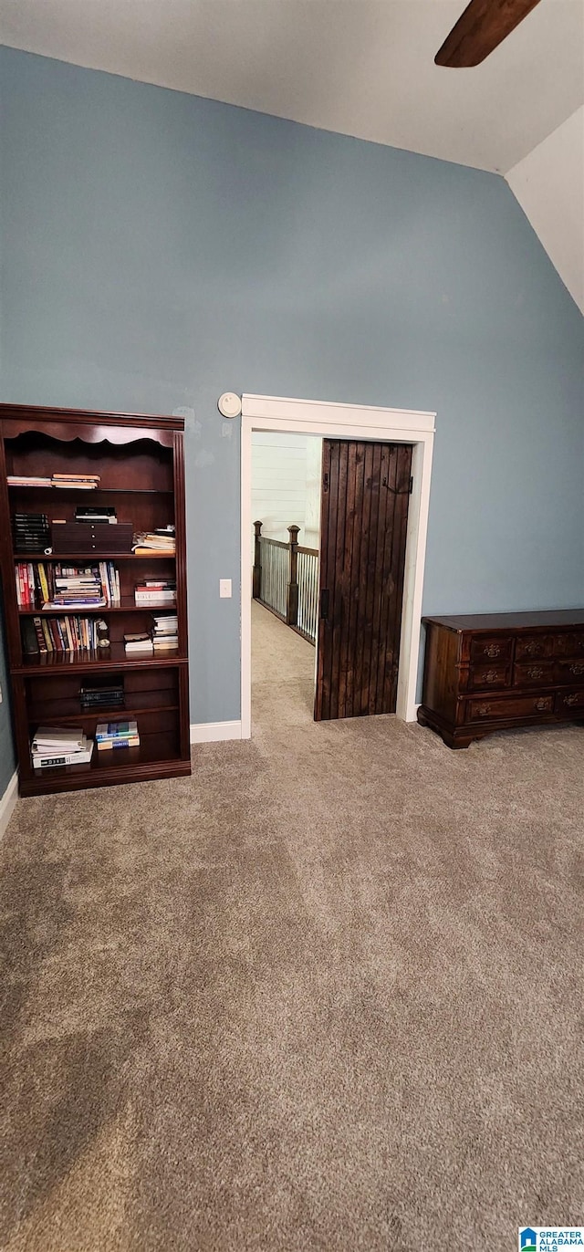 full bath with wood finished floors, vanity, a shower with shower curtain, and lofted ceiling