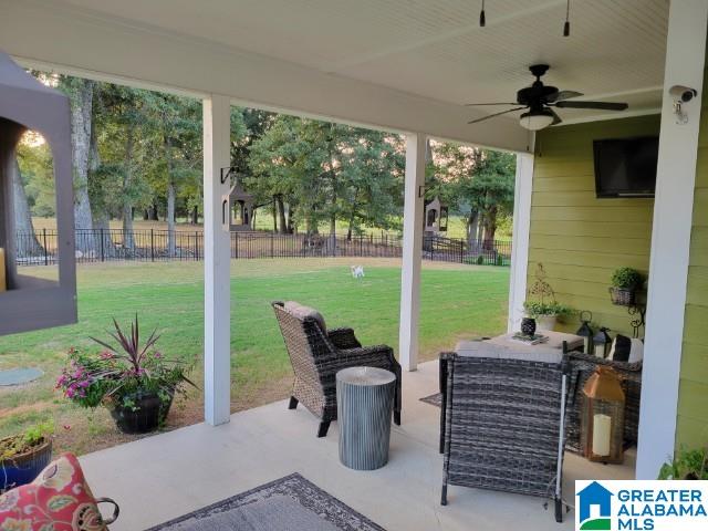 view of patio with ceiling fan