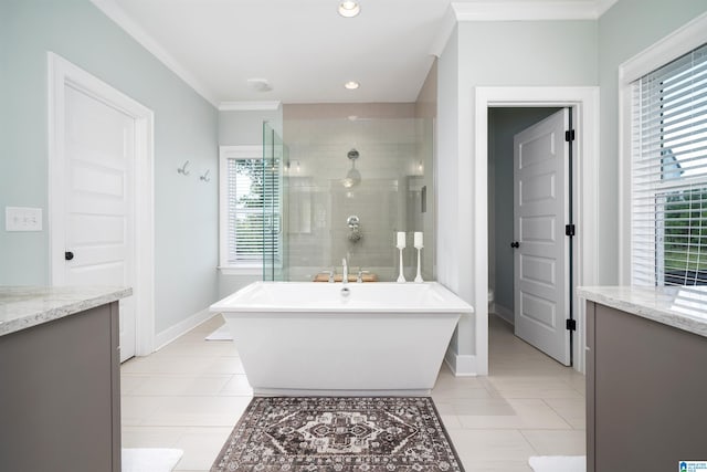 bathroom with crown molding, vanity, separate shower and tub, and tile patterned floors